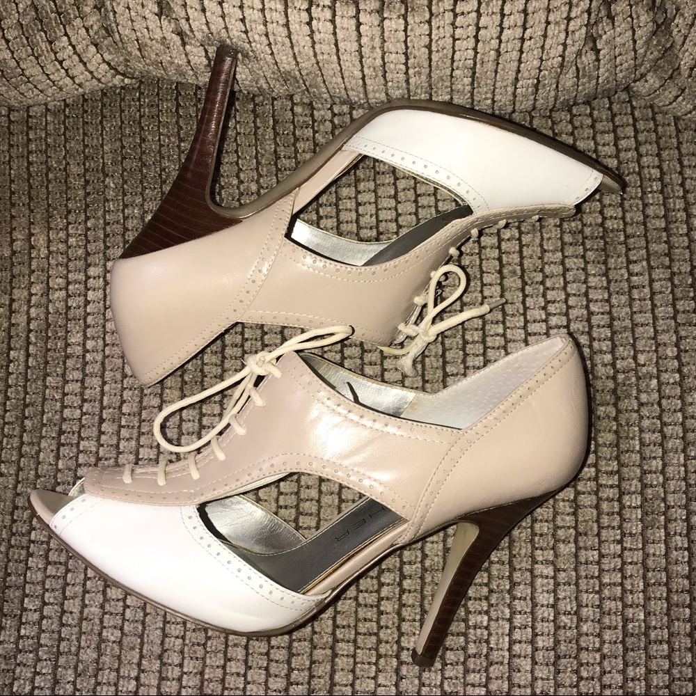 Marc Fisher female wing tip peep toe 2 tone heel.